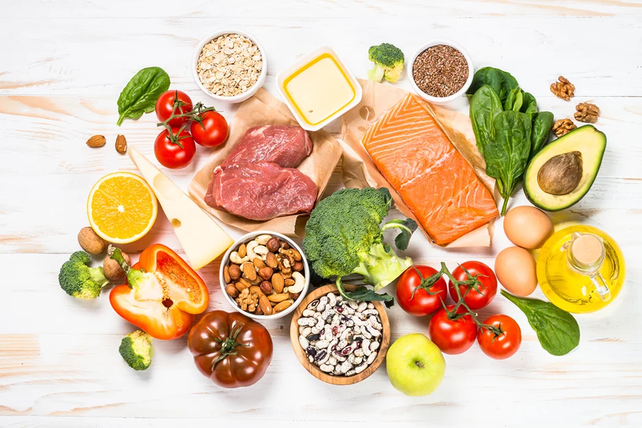 A variety of foods are arranged on a white background.