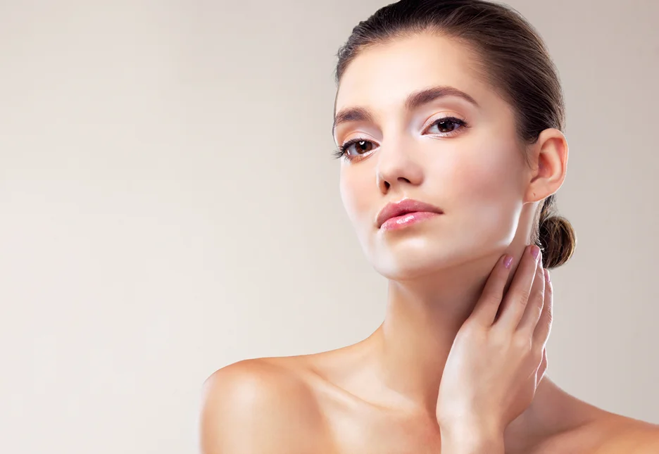 A woman posing with an aesthetic transformation of her chin