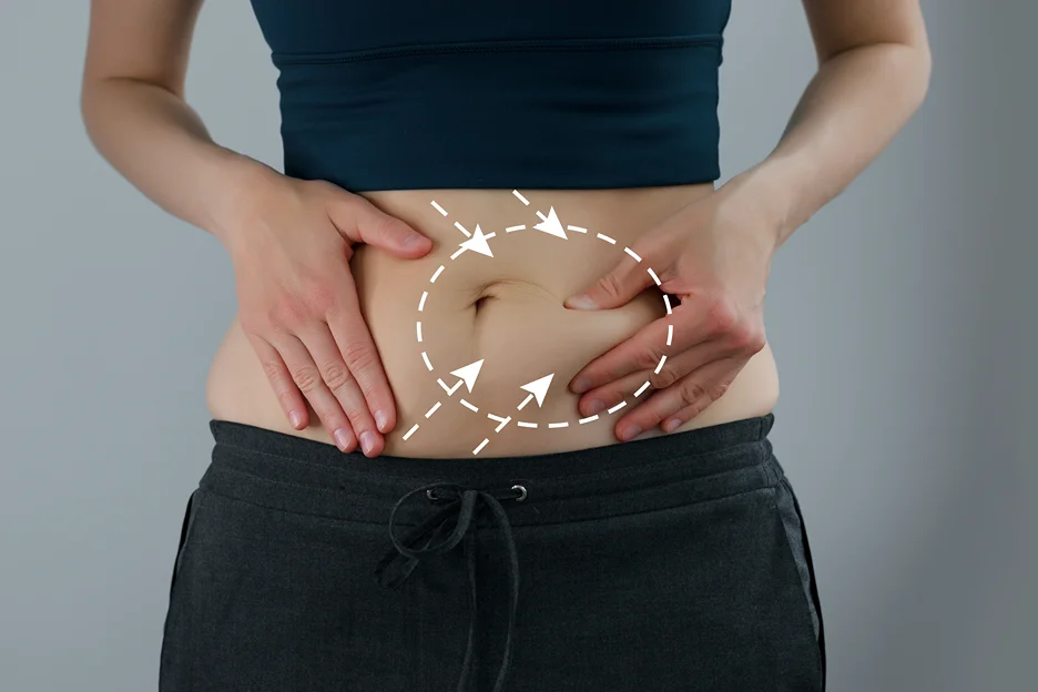 A Woman Touching her Belly Fat