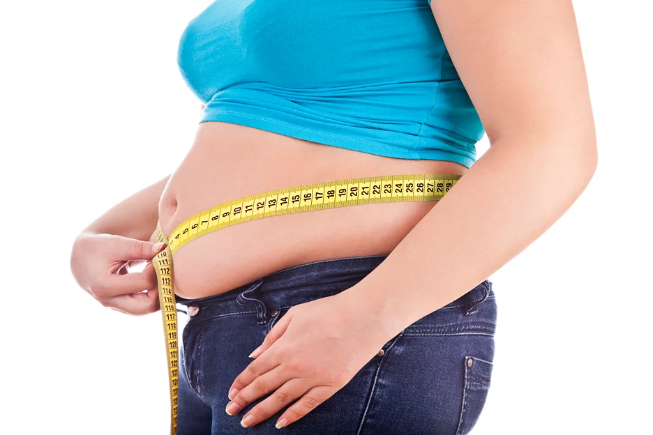 A Woman Measuring Her Abdomen